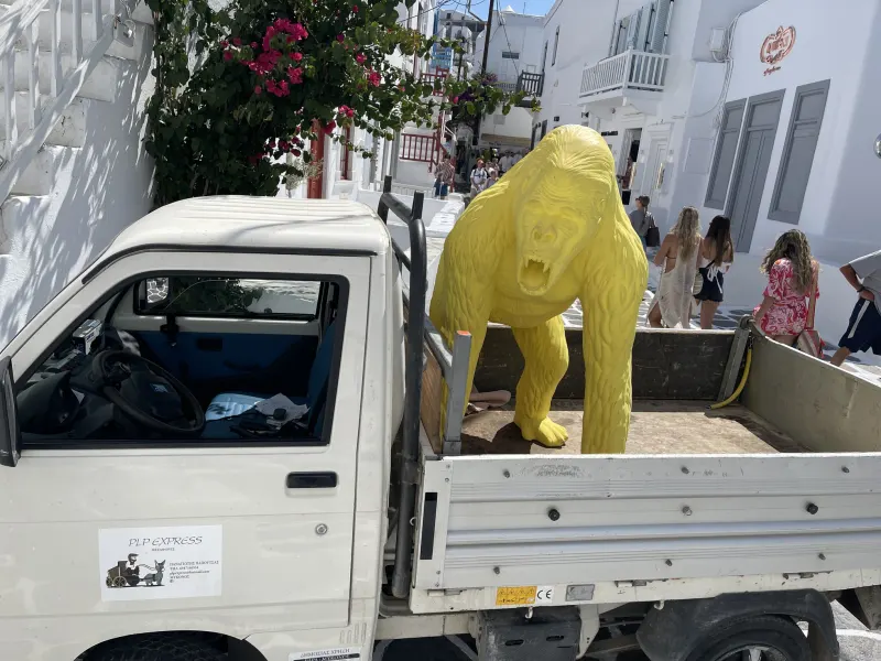Large yellow sculpture delivered in Mykonos town