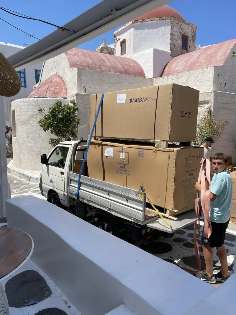 Boxes delivered to a whitewashed house